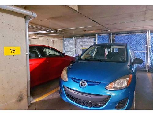 2200-6224 17 Avenue Se, Calgary, AB - Indoor Photo Showing Garage