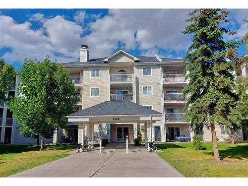 2200-6224 17 Avenue Se, Calgary, AB - Outdoor With Balcony With Facade