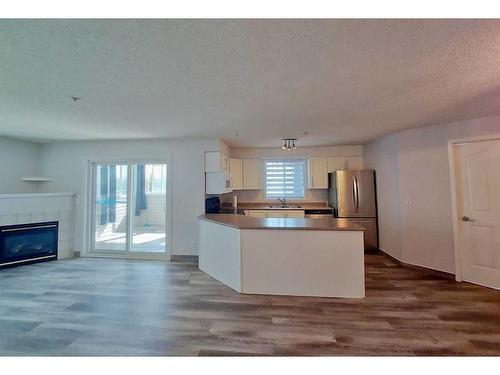 2200-6224 17 Avenue Se, Calgary, AB - Indoor With Fireplace