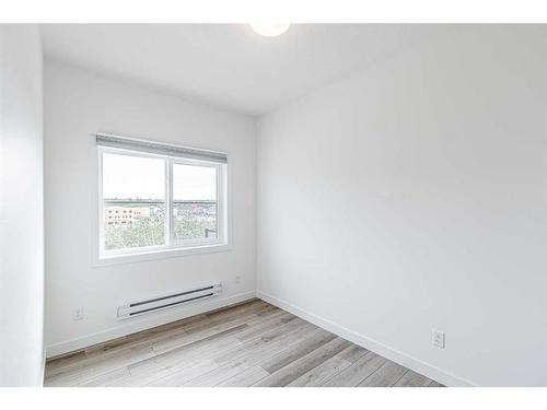 29 Spring Creek Common Sw, Calgary, AB - Indoor Photo Showing Other Room