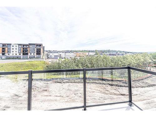 29 Spring Creek Common Sw, Calgary, AB - Outdoor With Balcony With View