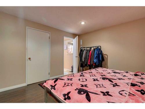 807 Erin Woods Drive Se, Calgary, AB - Indoor Photo Showing Bedroom