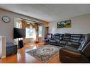 807 Erin Woods Drive Se, Calgary, AB  - Indoor Photo Showing Living Room 