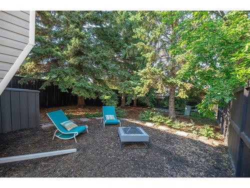 32 Cedardale Road Sw, Calgary, AB - Outdoor With Backyard