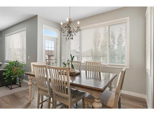 47 Sunset Terrace, Cochrane, AB - Indoor Photo Showing Dining Room