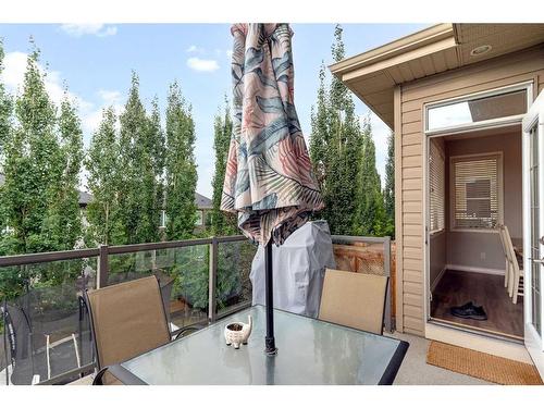 47 Sunset Terrace, Cochrane, AB - Outdoor With Balcony With Exterior