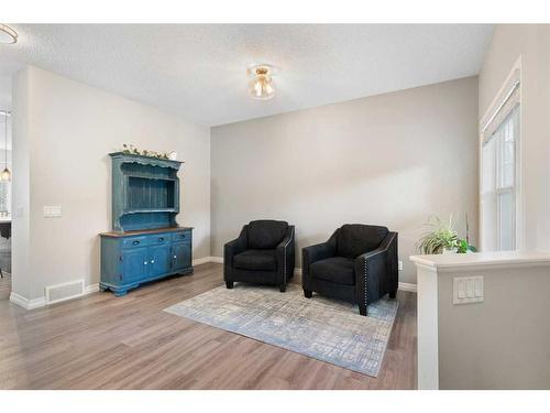 47 Sunset Terrace, Cochrane, AB - Indoor Photo Showing Other Room