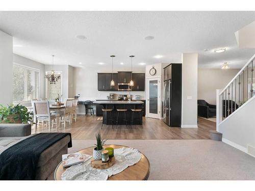 47 Sunset Terrace, Cochrane, AB - Indoor Photo Showing Living Room