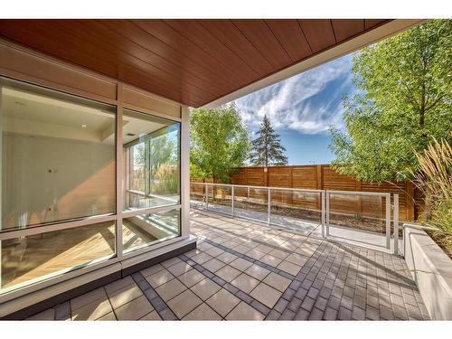 112-8445 Broadcast Avenue Sw, Calgary, AB - Outdoor With Deck Patio Veranda With Exterior