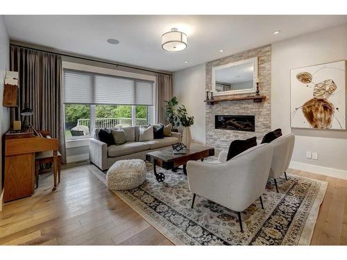 1215 15 Street Se, Calgary, AB - Indoor Photo Showing Living Room With Fireplace