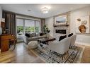 1215 15 Street Se, Calgary, AB  - Indoor Photo Showing Living Room With Fireplace 