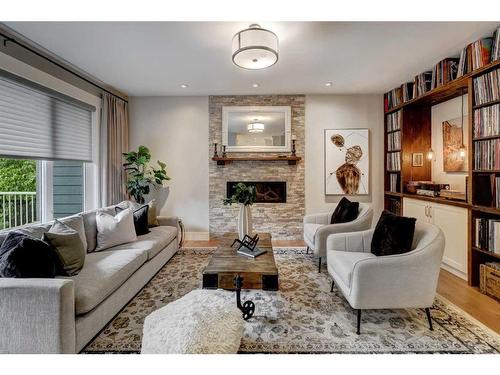 1215 15 Street Se, Calgary, AB - Indoor Photo Showing Living Room With Fireplace