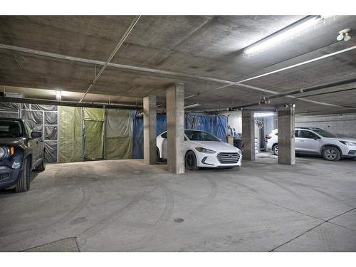 103-1026 12 Avenue Sw, Calgary, AB - Indoor Photo Showing Garage