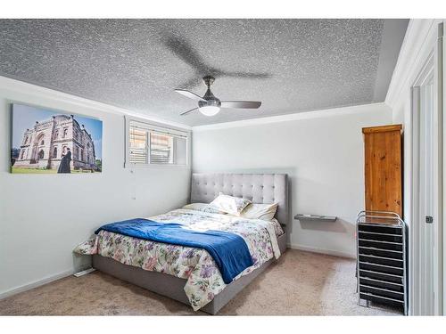 414 Mckenzie Towne Close Se, Calgary, AB - Indoor Photo Showing Bedroom