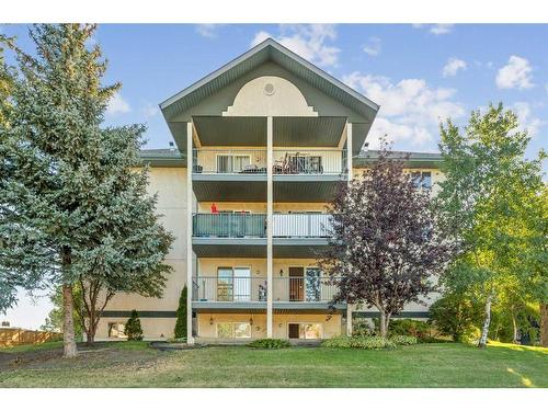 201-10 Dover Point Se, Calgary, AB - Outdoor With Balcony With Facade