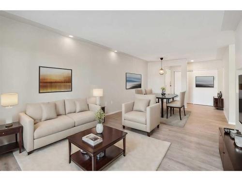 201-10 Dover Point Se, Calgary, AB - Indoor Photo Showing Living Room