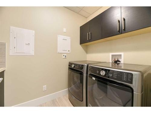 302-33 Burma Star Road Sw, Calgary, AB - Indoor Photo Showing Laundry Room