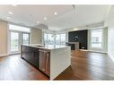 302-33 Burma Star Road Sw, Calgary, AB  - Indoor Photo Showing Kitchen With Upgraded Kitchen 