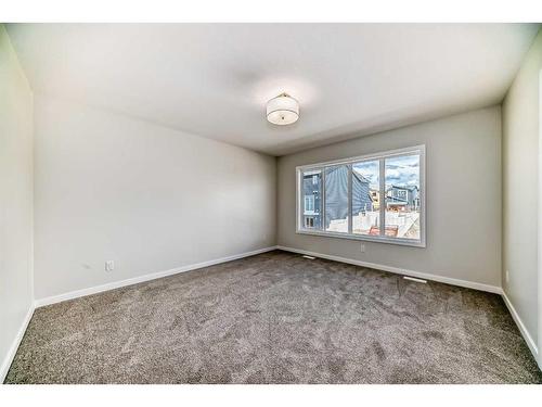 482 Lucas Way Nw, Calgary, AB - Indoor Photo Showing Other Room