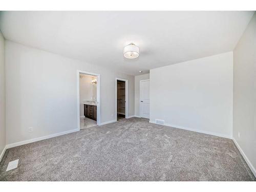 482 Lucas Way Nw, Calgary, AB - Indoor Photo Showing Other Room