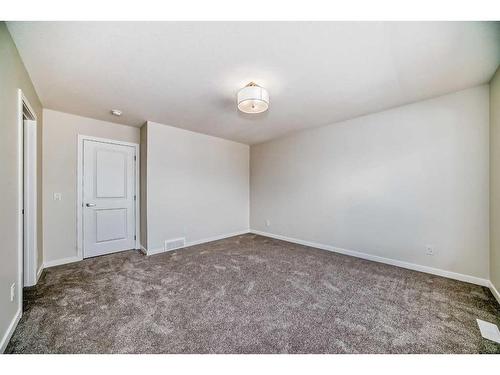 482 Lucas Way Nw, Calgary, AB - Indoor Photo Showing Other Room