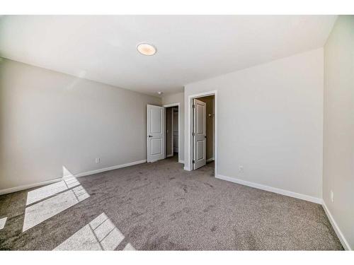 482 Lucas Way Nw, Calgary, AB - Indoor Photo Showing Other Room