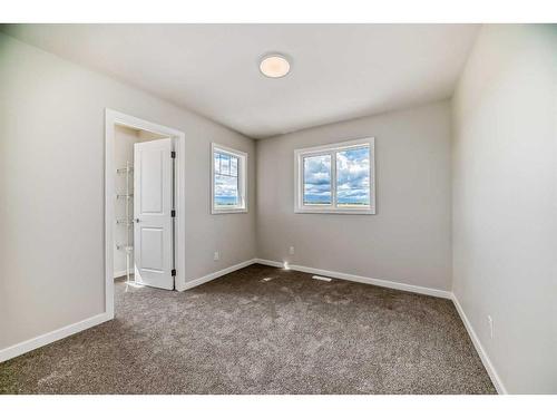 482 Lucas Way Nw, Calgary, AB - Indoor Photo Showing Other Room