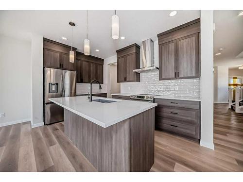 482 Lucas Way Nw, Calgary, AB - Indoor Photo Showing Kitchen With Stainless Steel Kitchen With Upgraded Kitchen