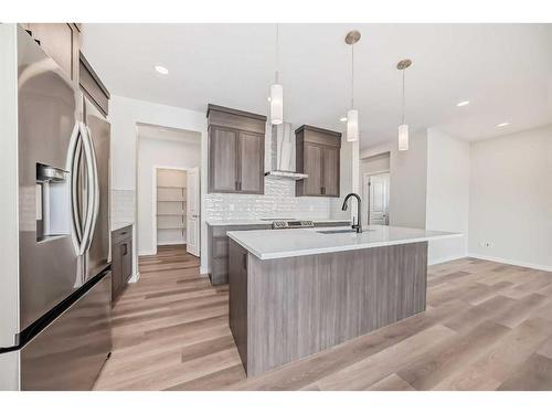 482 Lucas Way Nw, Calgary, AB - Indoor Photo Showing Kitchen With Stainless Steel Kitchen With Upgraded Kitchen