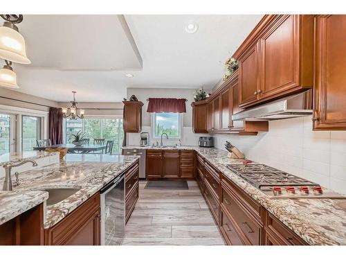 31 Tuscany Glen Park Nw, Calgary, AB - Indoor Photo Showing Kitchen With Double Sink