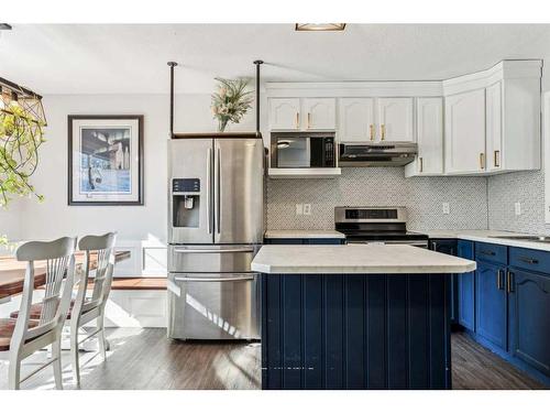 199 Hidden Creek Cove Nw, Calgary, AB - Indoor Photo Showing Kitchen With Upgraded Kitchen