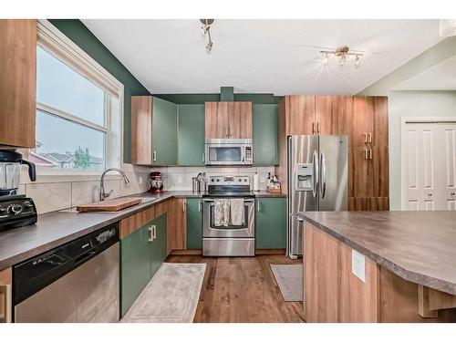 808-10 Auburn Bay Avenue Se, Calgary, AB - Indoor Photo Showing Kitchen