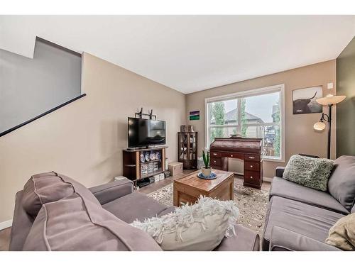 808-10 Auburn Bay Avenue Se, Calgary, AB - Indoor Photo Showing Living Room