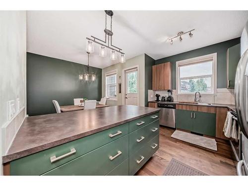 808-10 Auburn Bay Avenue Se, Calgary, AB - Indoor Photo Showing Kitchen With Double Sink