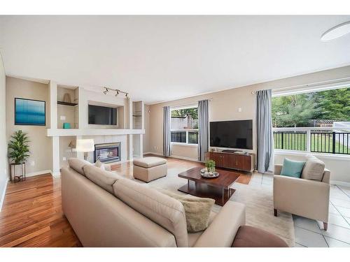 1 Valley Creek Road Nw, Calgary, AB - Indoor Photo Showing Living Room With Fireplace