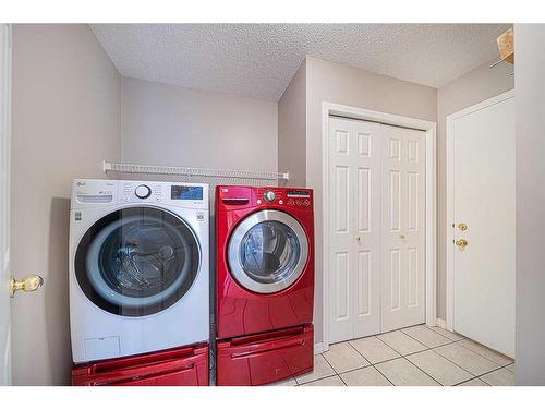 1 Valley Creek Road Nw, Calgary, AB - Indoor Photo Showing Laundry Room