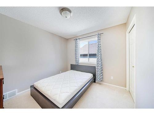 1 Valley Creek Road Nw, Calgary, AB - Indoor Photo Showing Bedroom