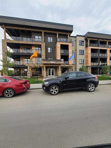 107-125 Wolf Hollow Crescent Se, Calgary, AB - Outdoor With Facade