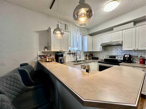 118-126 14 Avenue Sw, Calgary, AB - Indoor Photo Showing Kitchen With Double Sink