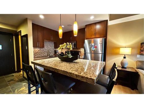 223B-1818 Mountain Avenue, Canmore, AB - Indoor Photo Showing Kitchen