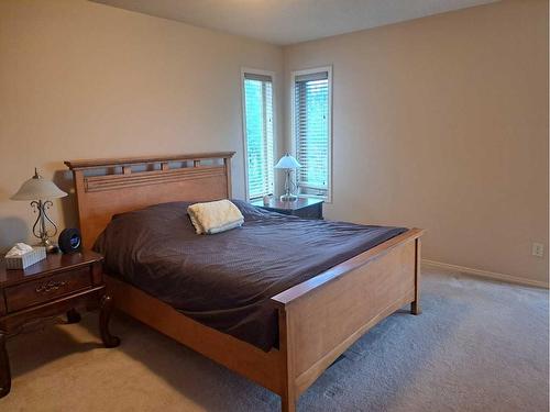 383 Everglade Circle Sw, Calgary, AB - Indoor Photo Showing Bedroom