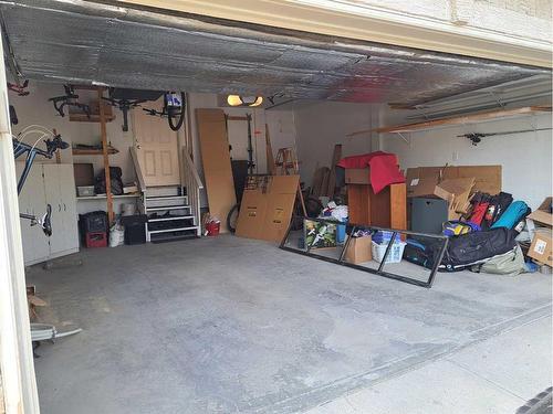 383 Everglade Circle Sw, Calgary, AB - Indoor Photo Showing Garage