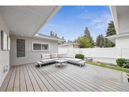 84 Hollyburn Road Sw, Calgary, AB - Outdoor With Deck Patio Veranda With Exterior