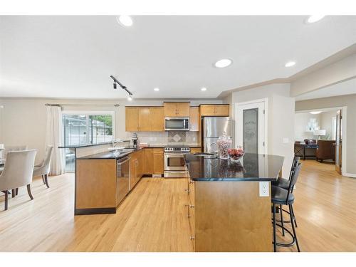 84 Hollyburn Road Sw, Calgary, AB - Indoor Photo Showing Kitchen With Upgraded Kitchen