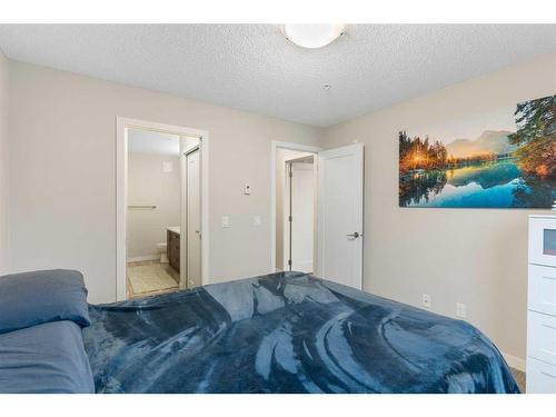 210-7 Westpark Common Sw, Calgary, AB - Indoor Photo Showing Bedroom