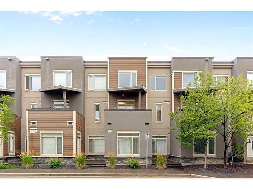 210-7 Westpark Common Sw, Calgary, AB - Outdoor With Balcony With Facade