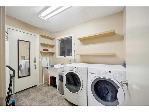 9980 Patton Road Sw, Calgary, AB - Indoor Photo Showing Laundry Room