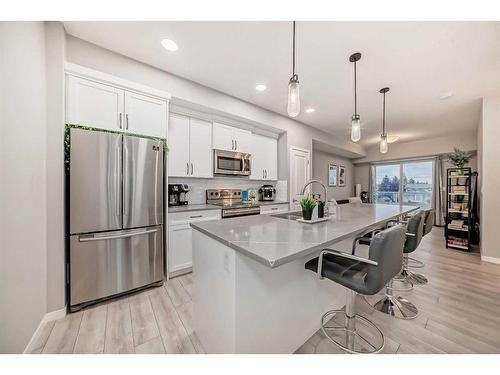 303-360 Harvest Hills Common Ne, Calgary, AB - Indoor Photo Showing Kitchen With Stainless Steel Kitchen With Upgraded Kitchen