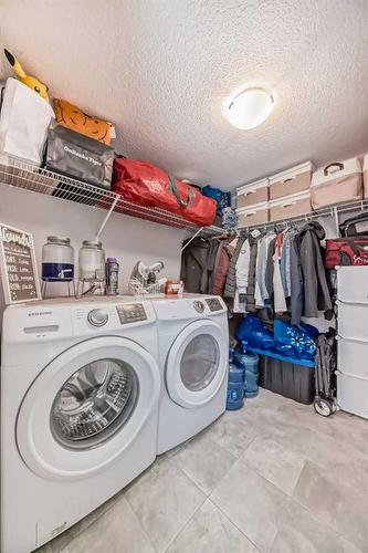 303-360 Harvest Hills Common Ne, Calgary, AB - Indoor Photo Showing Laundry Room