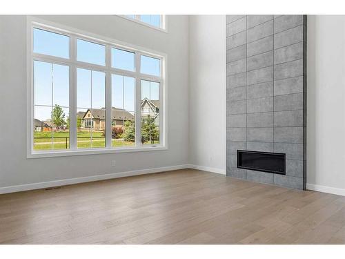 224 Marina Grove Se, Calgary, AB - Indoor With Fireplace